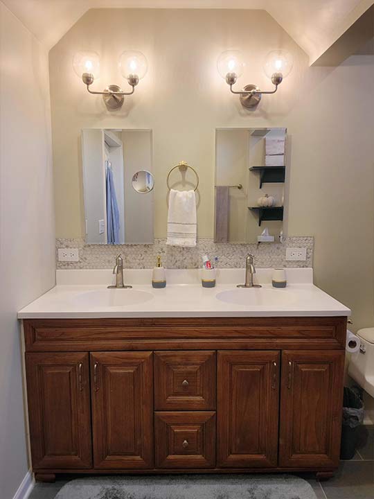 bathroom1-after the "After" result of our bathroom remodel, showing the new vanity and lighting
