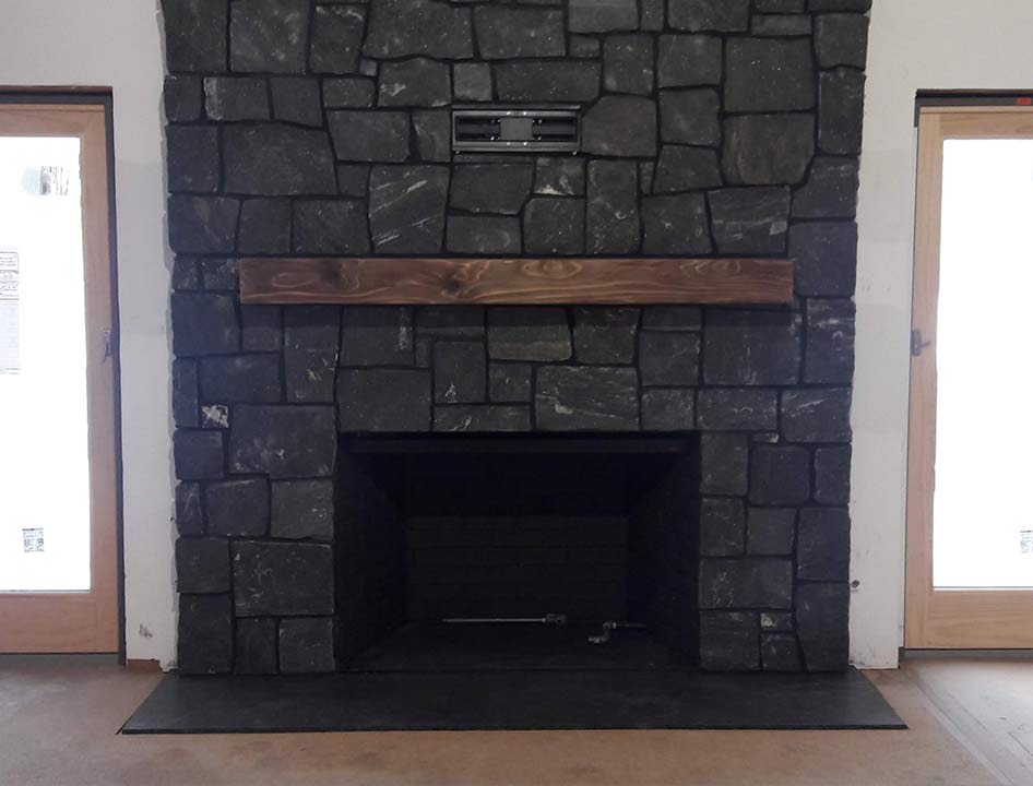 fireplace1-after a newly remodeled black tile fireplace