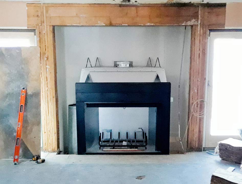 fireplace1-before demo of a fireplace prior to remodelling