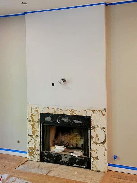 fireplace2-before demo of a fireplace prior to remodeling
